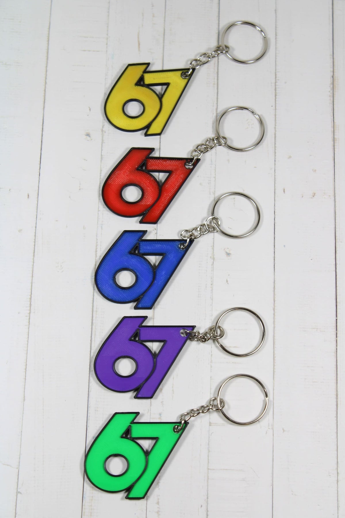 Porte-clé 67 imprimé en 3D disponible en plusieurs couleurs