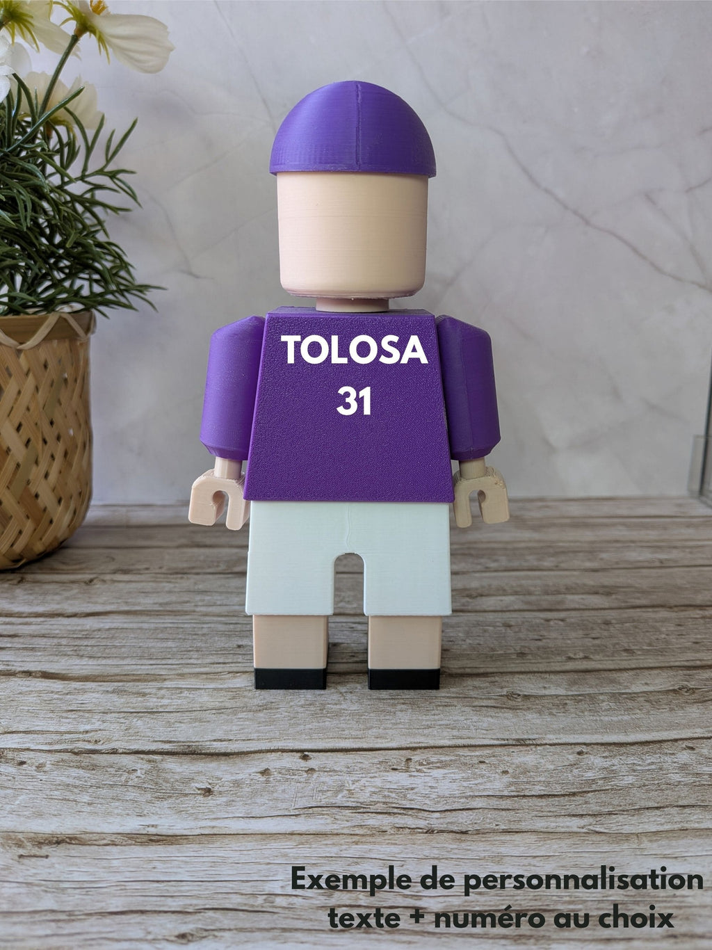 Exemple de figurine TFC personnalisée avec texte et numéro au dos